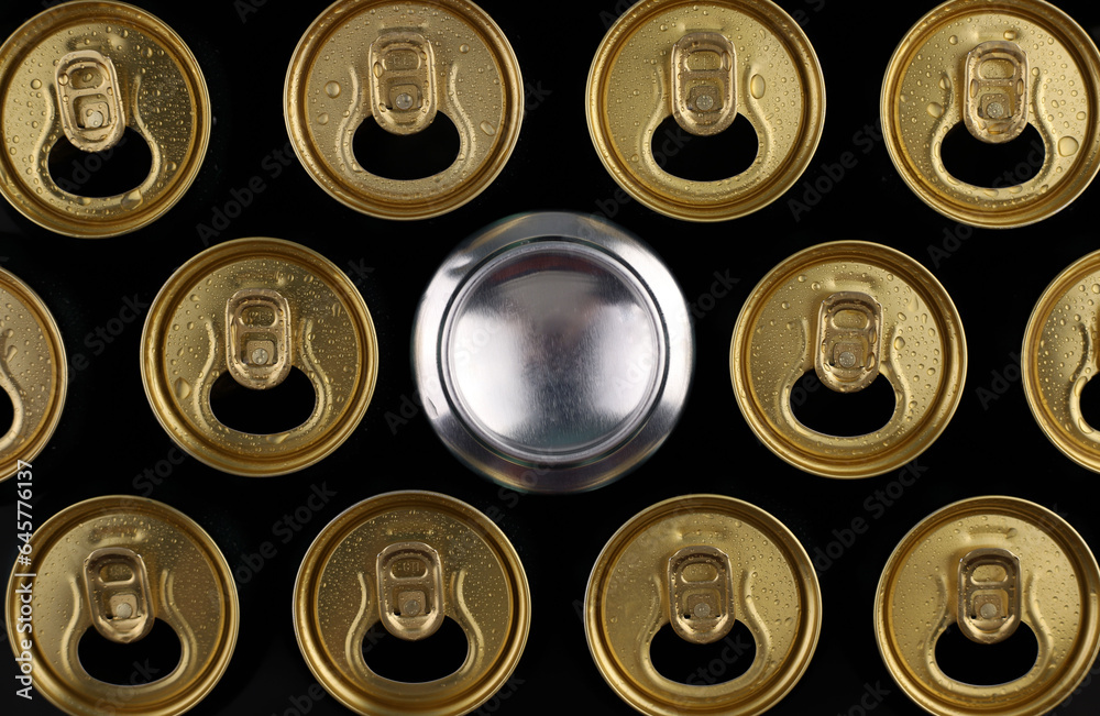 gold-colored tin can with water drops. view from above gold-colored tin can with water drops. view from above