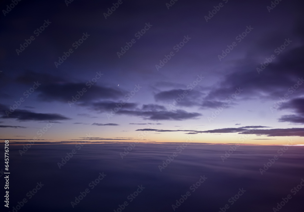 Purple cloudscape during sunset, aerial view Purple cloudscape during sunset, aerial view