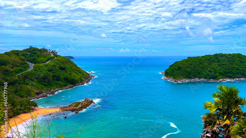 Ya Nui Beach and Nai Harn Beach in Phuket Thailand  turquoise blue waters  lush green mountains colourful skies. Phuket is a tropical island many palms teaming with wildlife and sea fisheries 