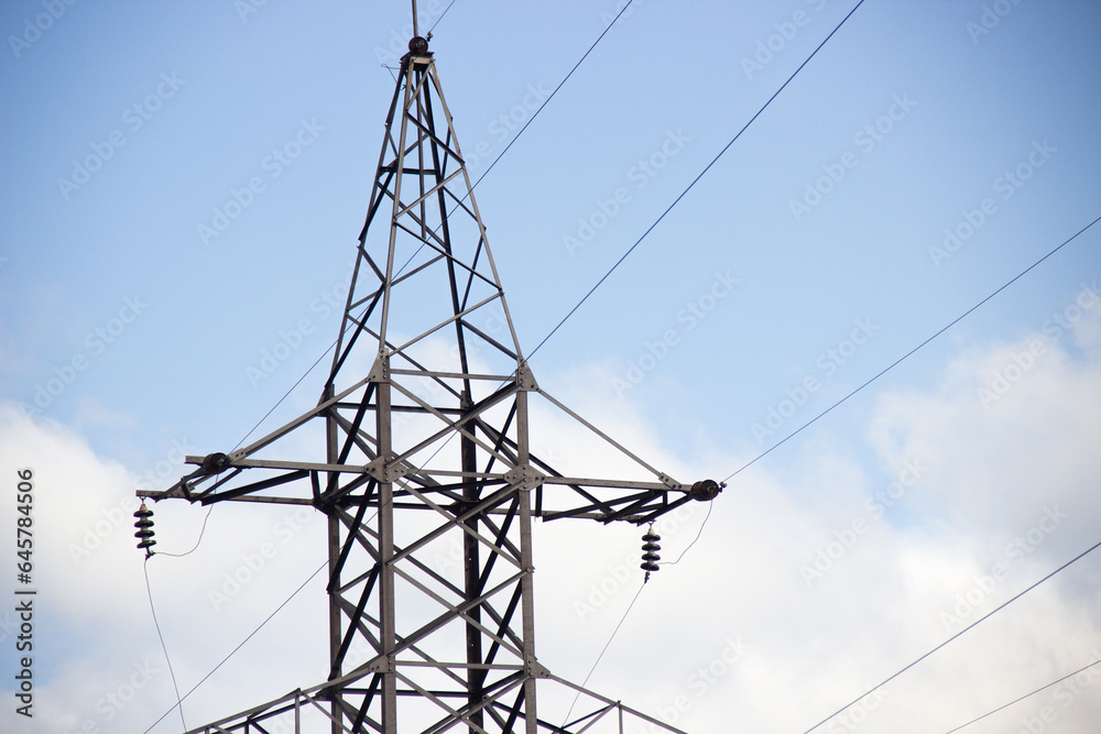 Photo of a support for electricity in good summer weather. Photo of a support for electricity in good summer weather.