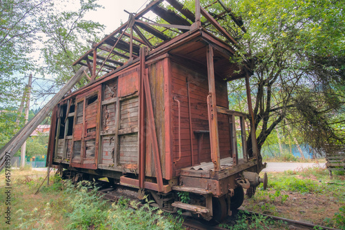 Old vintage abandoned cargo train wooden carriage