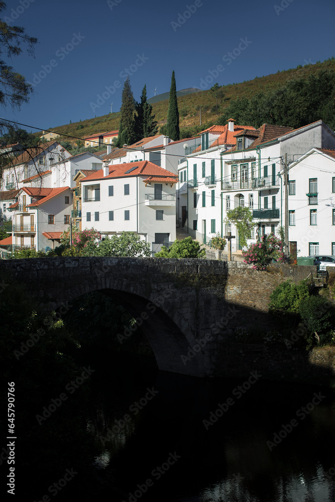 View of the pedestrian bridge in Vide (Seia) in the foot of Serra da Estrela, Portugal.