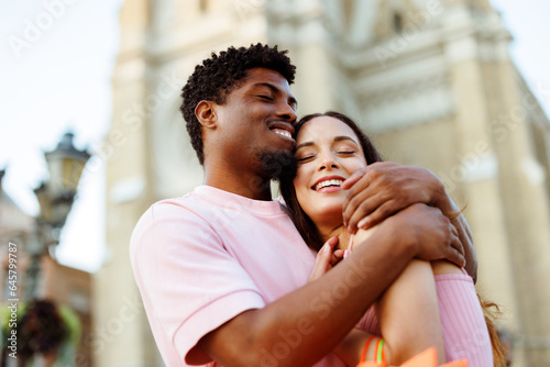 Young loving couple in an embrace in the city