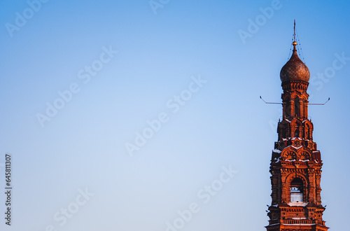 tower of the cathedral in kazan russia on sky background