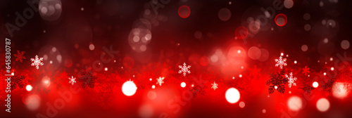 Defocused Red christmas background with snowflakes and bokeh lights. 