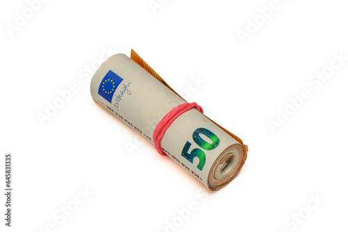 euros rolled into a tube, 50 euro bills on a white background 19