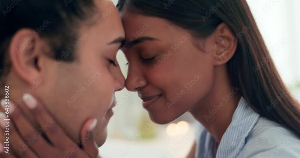Love, intimate and young couple at their home relaxing, bonding and resting together on a weekend. Happy, smile and interracial man and woman with romance, connection and trust in their apartment. Love, intimate and young couple at their home relaxing, bonding and resting together on a weekend. Happy, smile and interracial man and woman with romance, connection and trust in their apartment.
