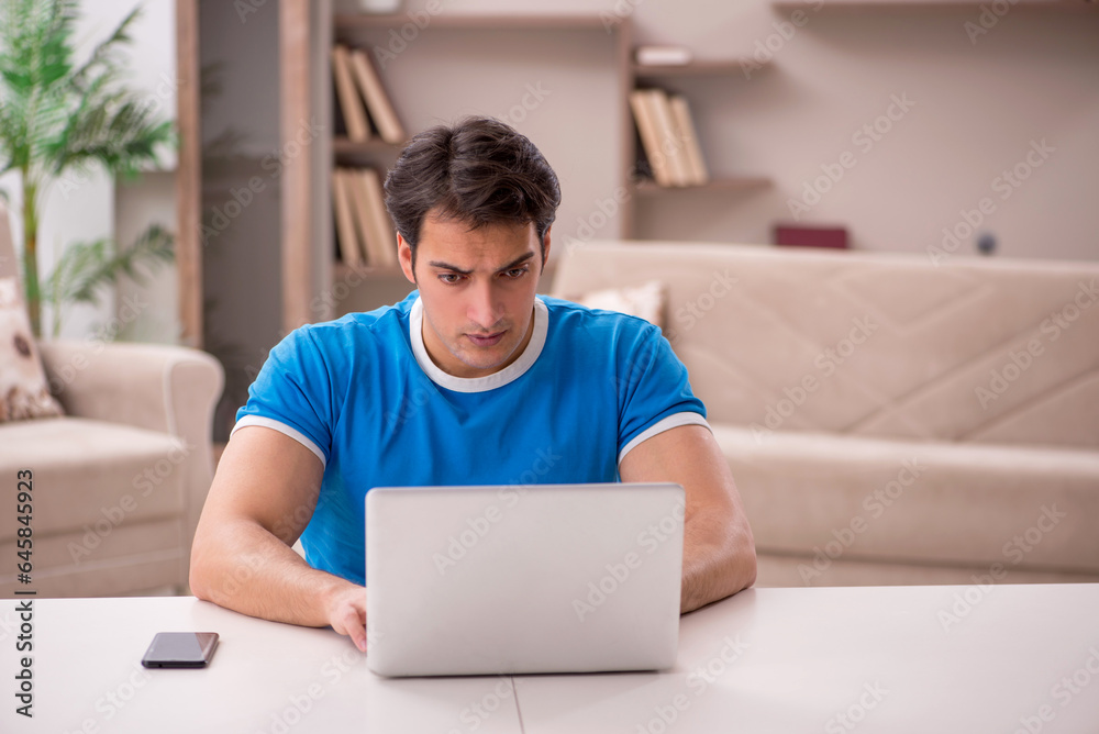 Young man freelancer working from home Young man freelancer working from home