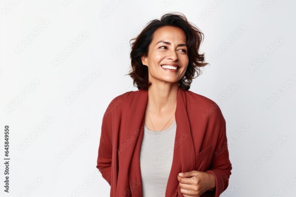Medium shot portrait photography of a Peruvian woman in her 40s against a white background Medium shot portrait photography of a Peruvian woman in her 40s against a white background