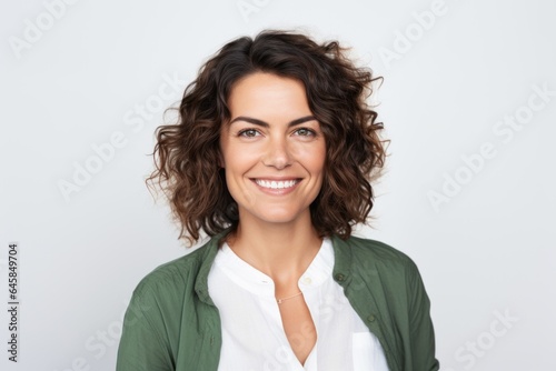 Portrait photography of a French woman in her 30s against a white background