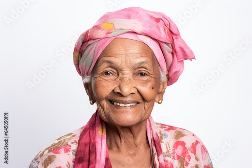 Group portrait photography of a 100-year-old elderly Colombian woman wearing a foulard against a white background