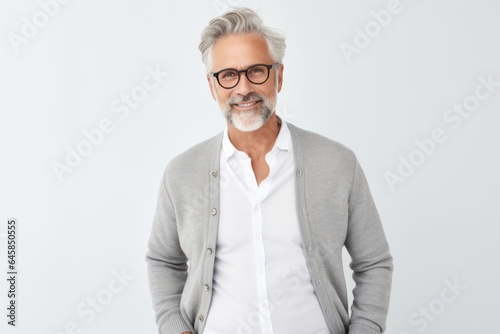 Lifestyle portrait photography of a Swedish man in his 50s against a white background © Anne Schaum