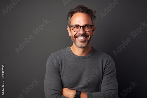 Medium shot portrait photography of a Colombian man in his 40s against a minimalist or empty room background