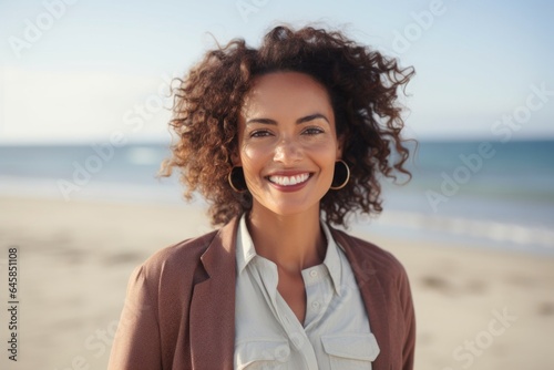Medium shot portrait photography of a Colombian woman in her 30s against a beach background