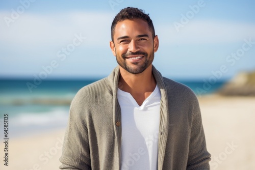Portrait photography of a Colombian man in his 30s against a beach background