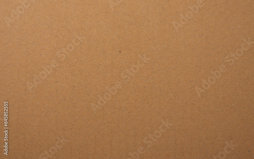 Texture of brown craft or kraft paper background, cardboard sheet. recycle paper. copy space for text for your work