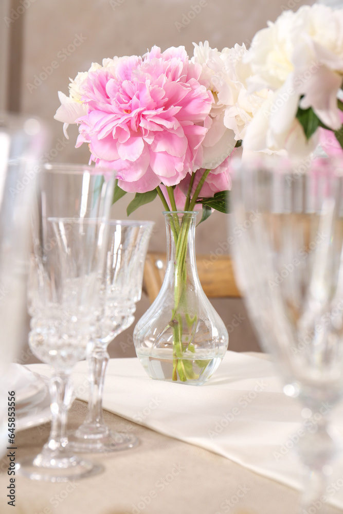 Stylish table setting with beautiful peonies indoors Stylish table setting with beautiful peonies indoors