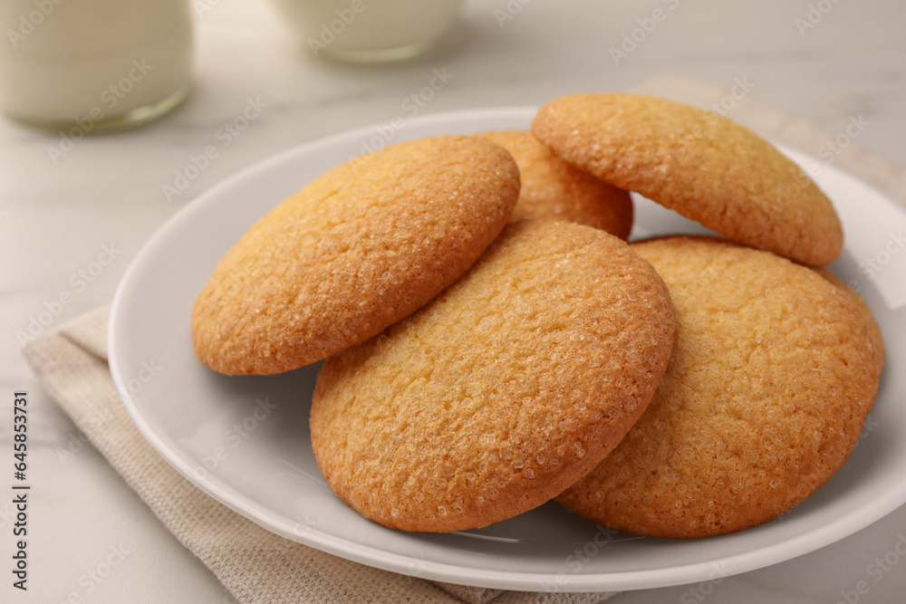 Delicious Danish butter cookies on white marble table, closeup Delicious Danish butter cookies on white marble table, closeup