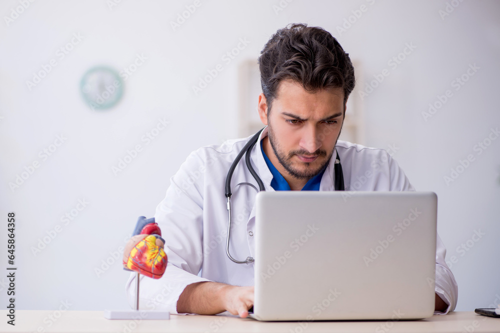 Young male doctor in telemedicine concept