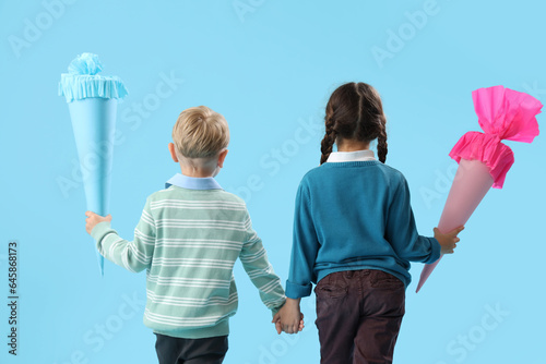 Little boy and girl with co...
