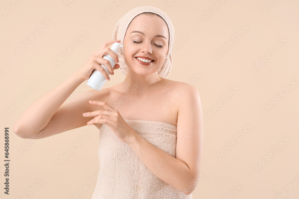 Pretty young woman after shower and with lotion on beige background Pretty young woman after shower and with lotion on beige background