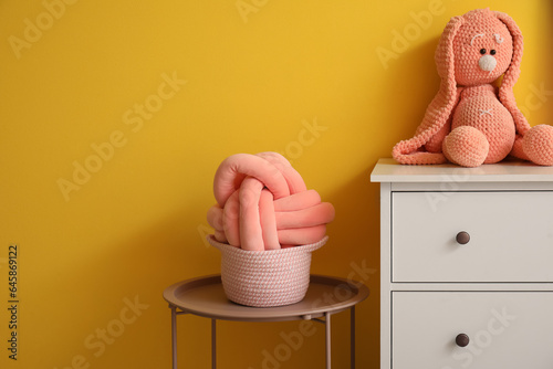 White chest of drawers with...