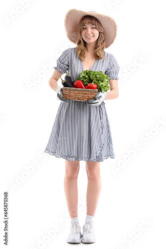 Happy young female farmer w...