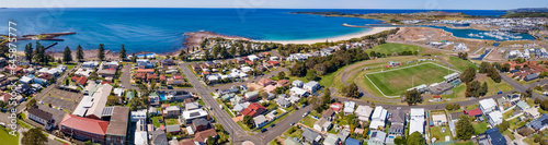 Panoramic aerial drone view of Shellharbour looking over Shellharbour South Beach and Shellharbour Marina on the New South Wales South Coast, Australia on a sunny day 
