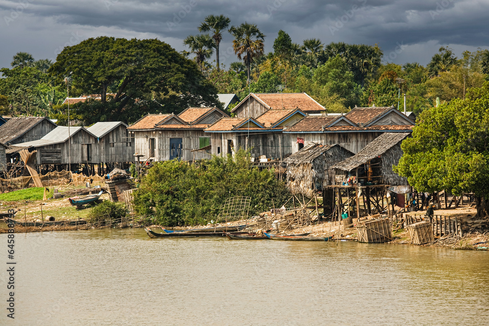Poor Cambodians living in poverty along a river Poor Cambodians living in poverty along a river