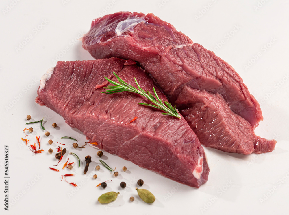 raw beef steak with rosemary isolated on white background, copy space  3