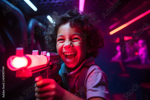 Happy child playing laser battle game