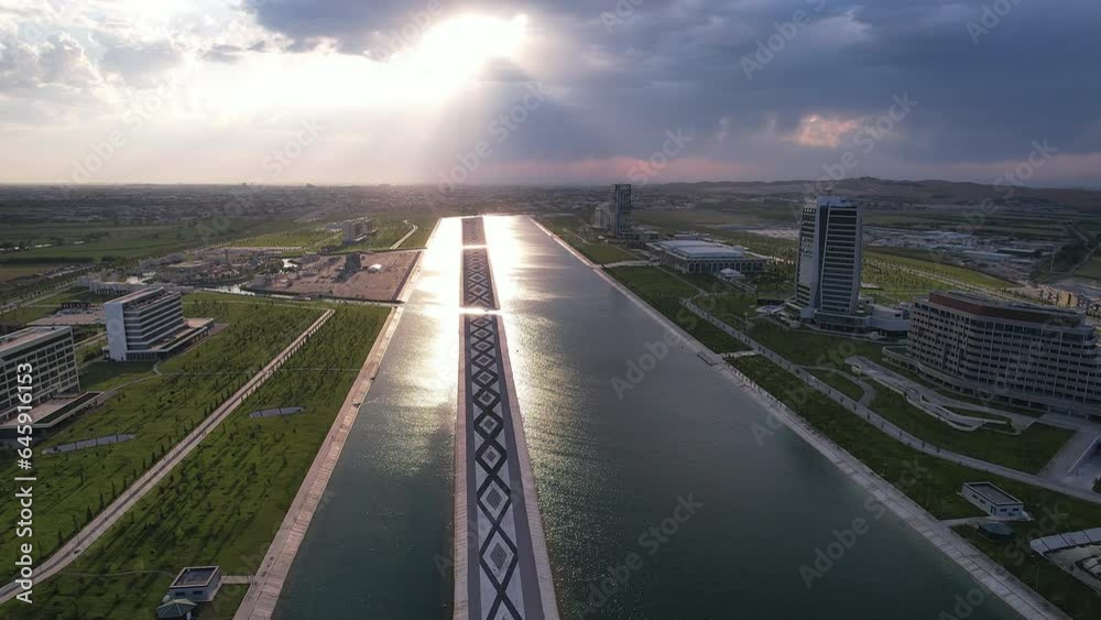 Bird eye view of the Silk Road Samarkand canal at sunset, Uzbekistan. - May 25, 2023 at sunset. Aerial shot Bird eye view of the Silk Road Samarkand canal at sunset, Uzbekistan. - May 25, 2023 at sunset. Aerial shot