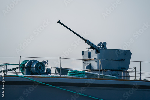 Military air deffence gun on artillery war ship photo