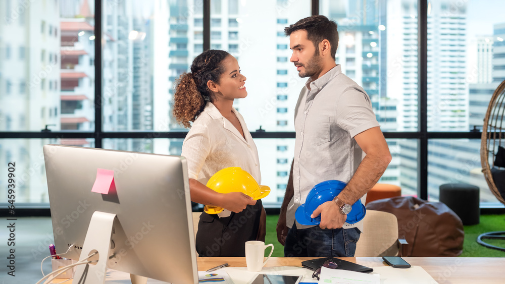Fototapeta premium Business engineer partner woman and businessman standby together for start up new Project outdoor modern office. City background. Teamwork and Business Concept