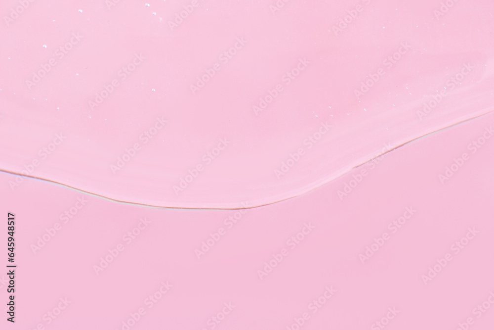Transparent gel on a pink background.