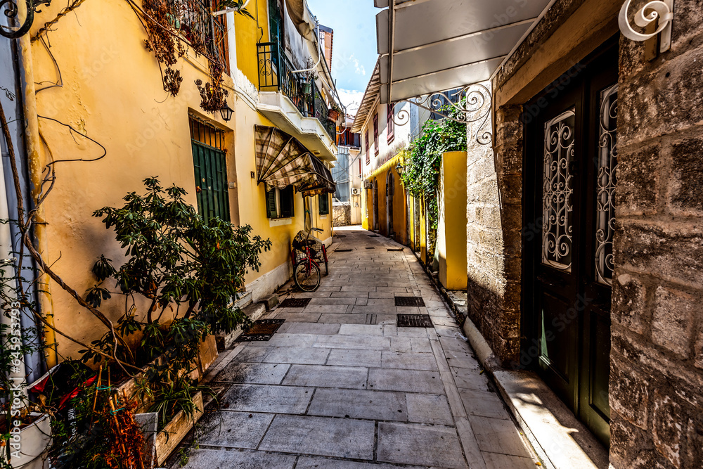 Colourful Lefkada street with yellow buildings, Lefkada, Greece