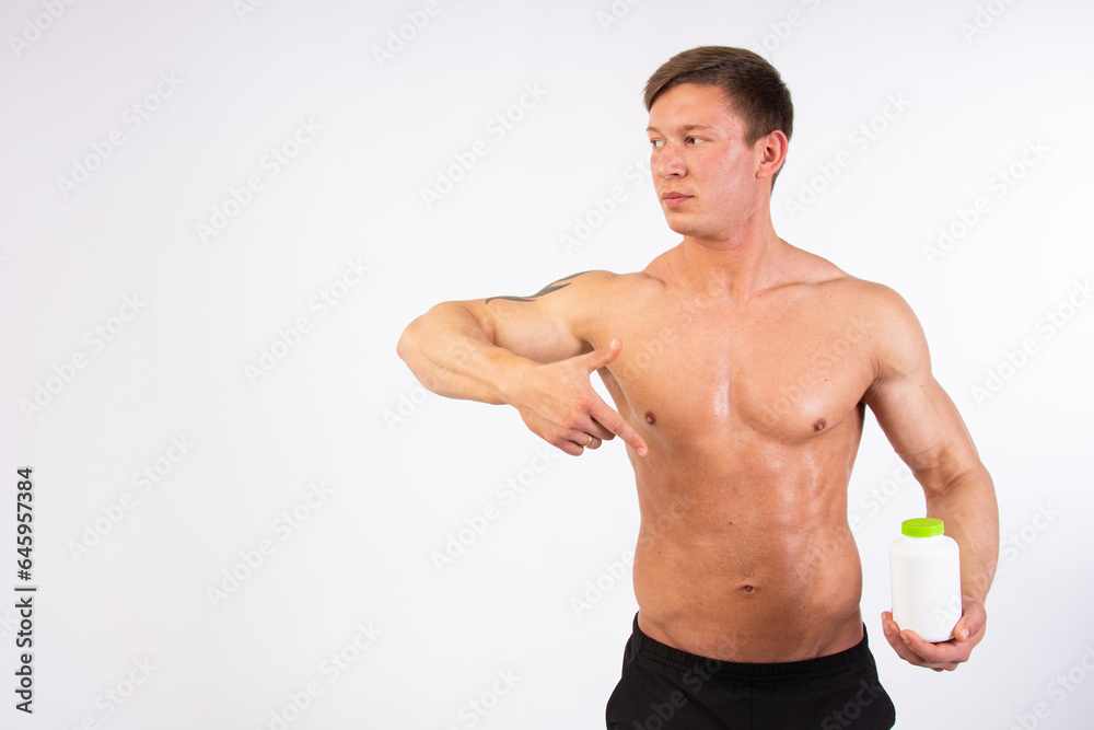 Diet, sport and healthy lifestyle. A guy with a beautiful body. Proper nutrition and sports supplements. Diet, sport and healthy lifestyle. A guy with a beautiful body. Proper nutrition and sports supplements.