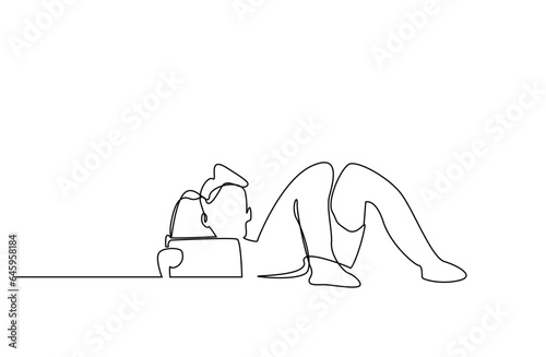 home young boy relax using tablet lying down line art