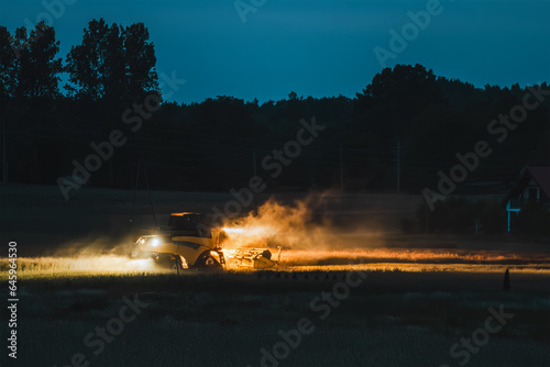 Efficient Agricultural Operations. Machinery Cultivating Fields and Harvesting at Sunset. Rural landscape.