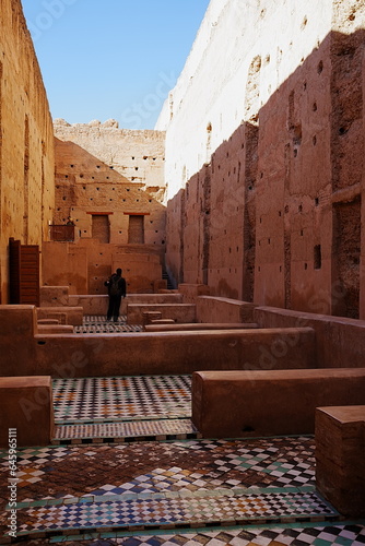 Mosaics on floor in El Badi palace at Marrakech city in Morocco - vertical photo