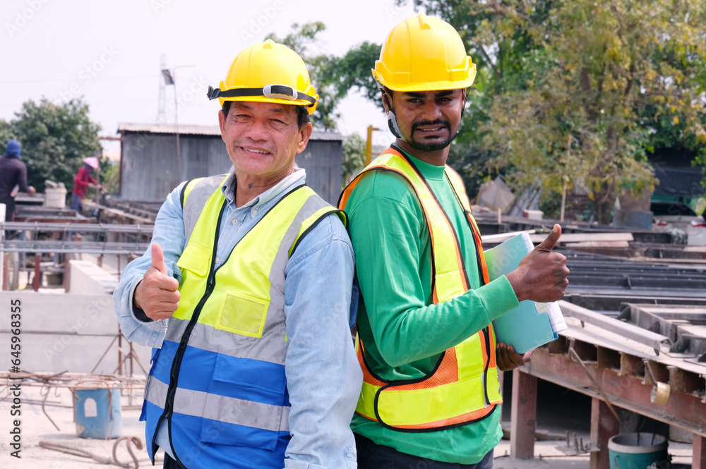 Workers are working at the construction site. Workers are working at the construction site.