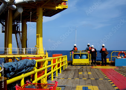 In offshore oil and gas work activity, the worker transfers from a boat of offshore marine service to oil and gas platforms by safe swing rope