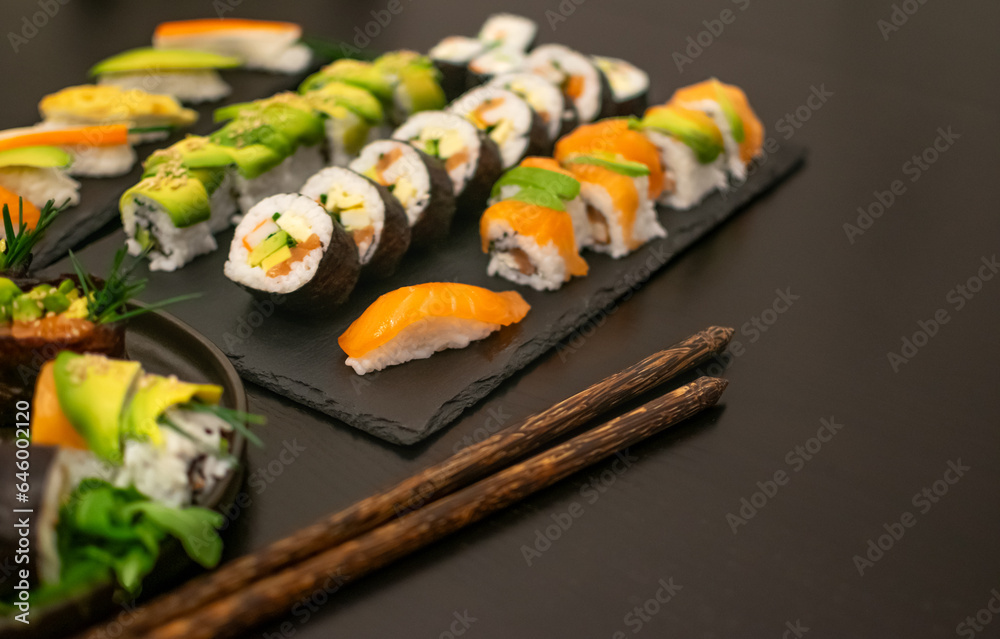 Luxurious and creative Sushi as Nigiri,Futomaki,Uramaki with Coconut chopsticks Luxurious and creative Sushi as Nigiri,Futomaki,Uramaki with Coconut chopsticks
