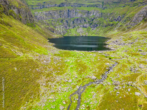 Aerial view of Coumshingaun Lough with rocks and vegetation photo