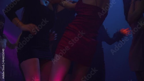 group of diversity happy sexy young people enjoy dancing in night club .Two sensual women  lesbian