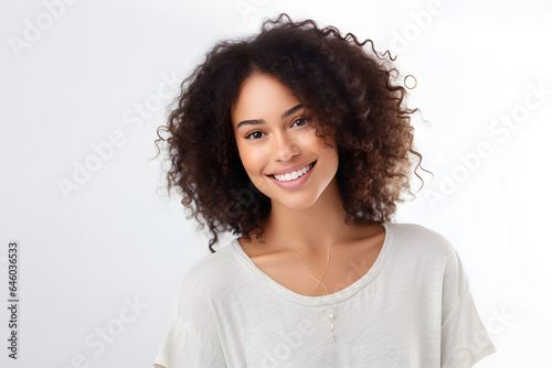 Beautiful young smiling afroamerican woman with curly hair portrait