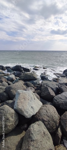 large mountain stones on the seashore