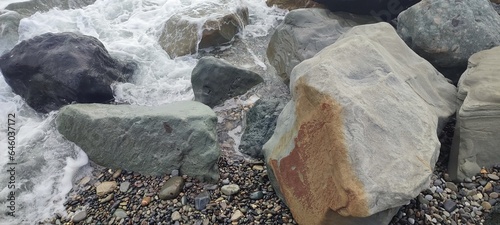 large mountain stones on the seashore