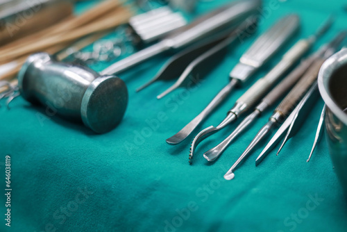 Soft focus Surgical tools and equipment on green cloth. Sterilized