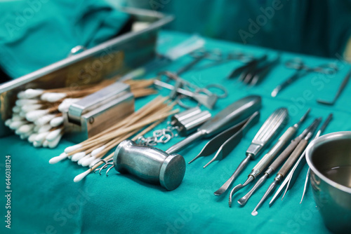 Soft focus Surgical tools and equipment on green cloth. Sterilized